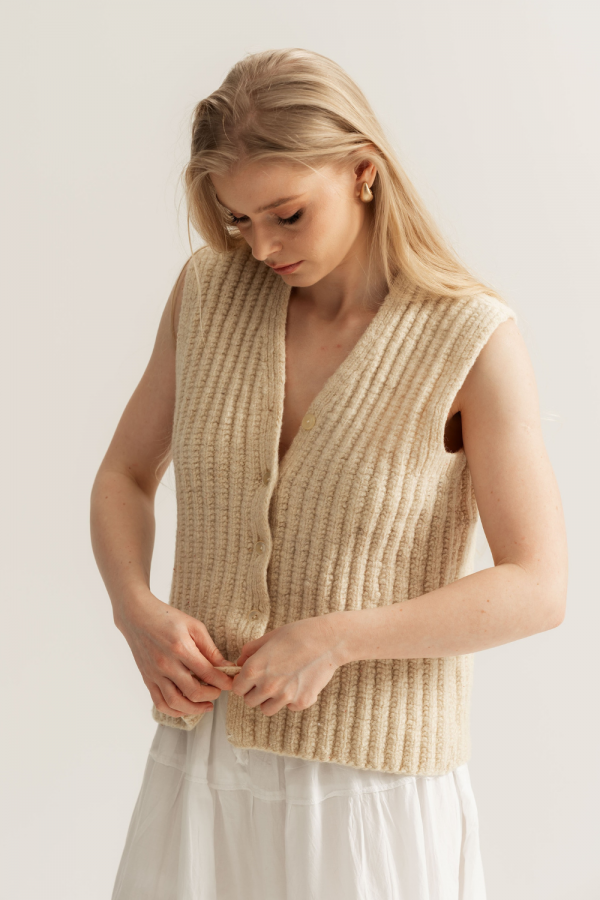 The hand-knitted wool vest